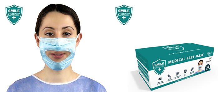 Woman wearing Smile Shield, and a box of Smile Shield masks